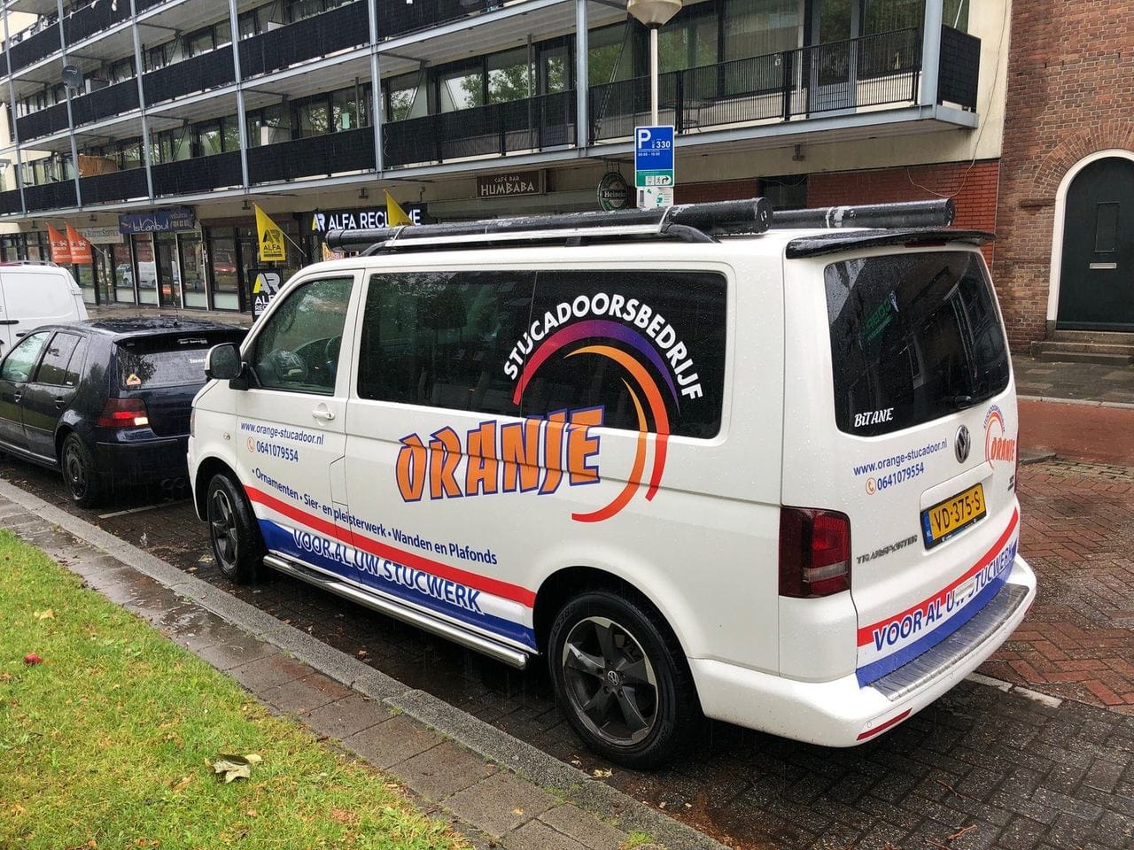 Autoreclame bestelbus Oranje Stucadoor Rotterdam